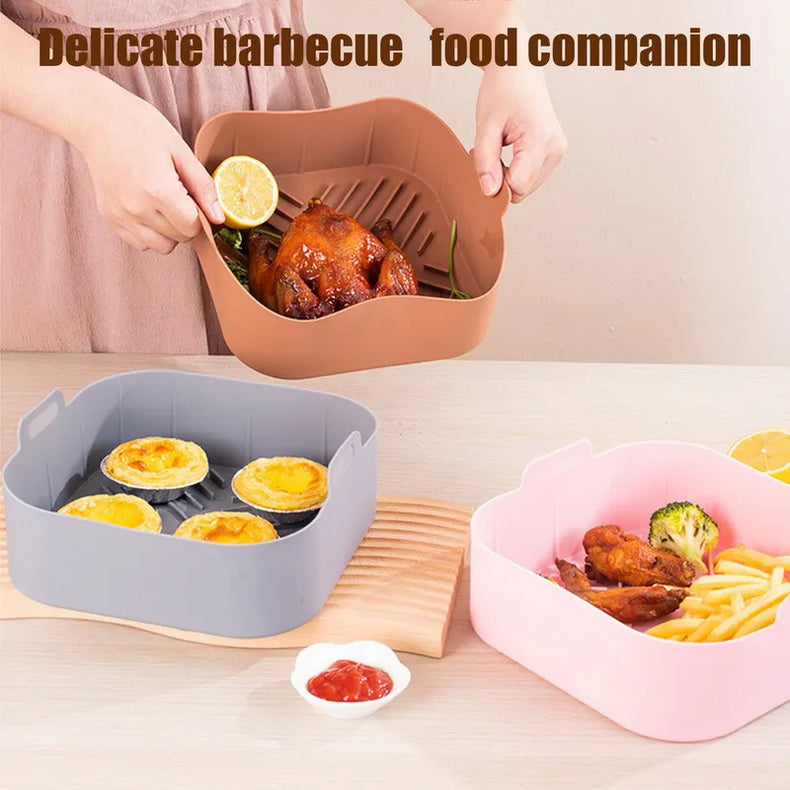 Silicone liners used to serve example cooked foods