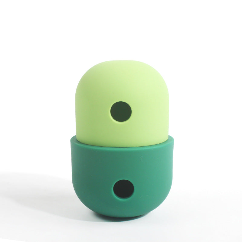 Light green and dark green treat-dispensing pet toy