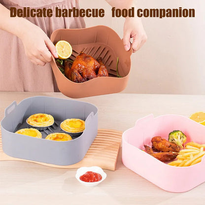 Silicone liners used to serve example cooked foods