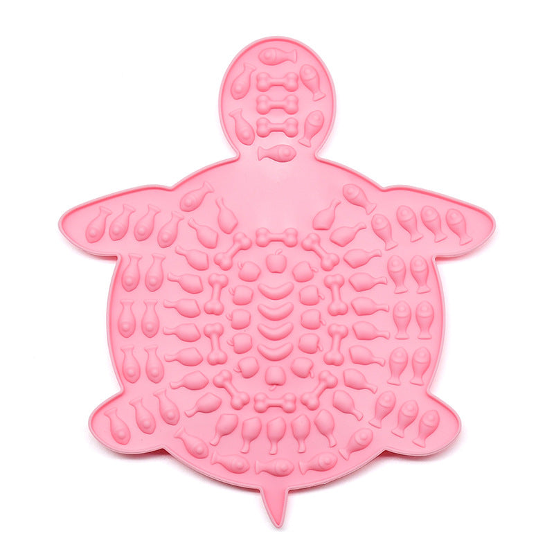 Pink turtle-shaped silicone pet lick mat with textured surface