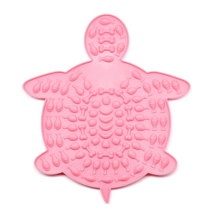 Pink turtle-shaped silicone pet lick mat with textured surface