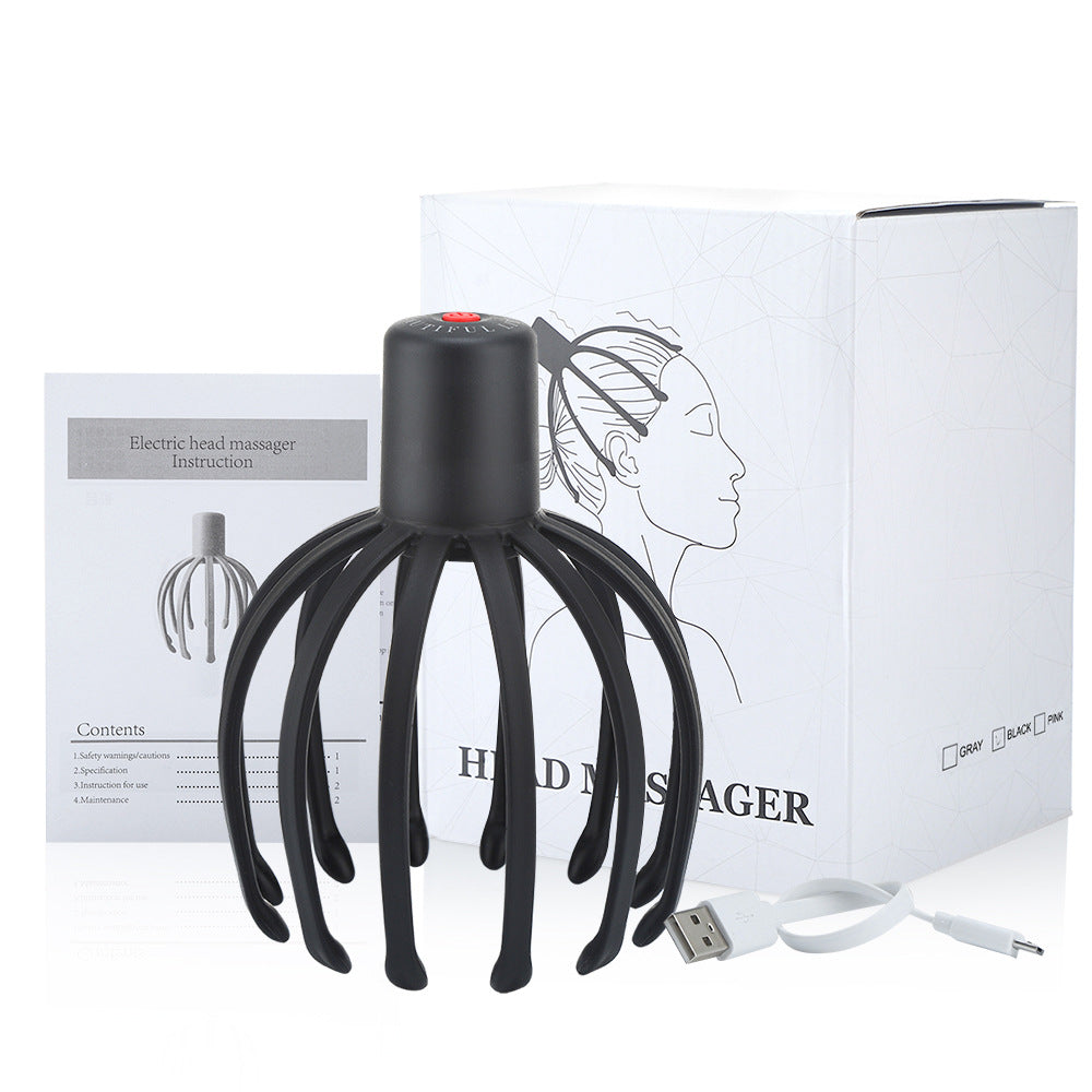 Black scalp massager pictured with box, instructions and cable