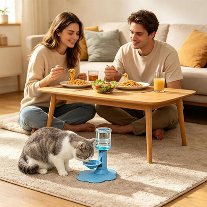 Cat using a blue dispenser beside a seated couple
