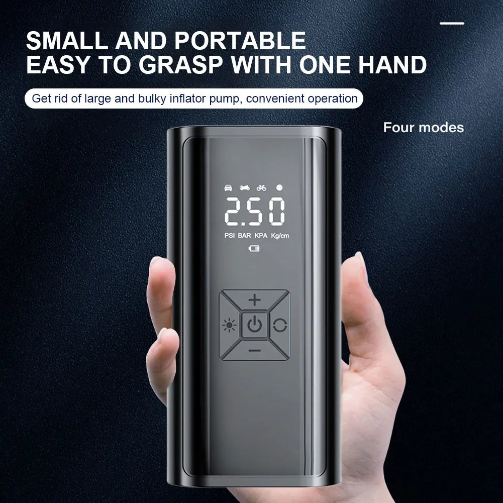 Black digital inflator held in one hand