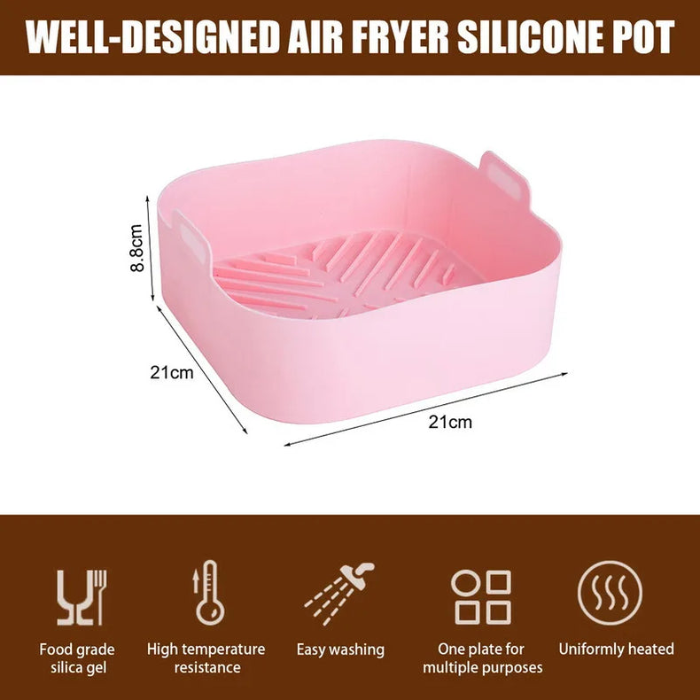 Pink square air fryer liner with diagram labeled 21 by 21 by 8.8 centimeters