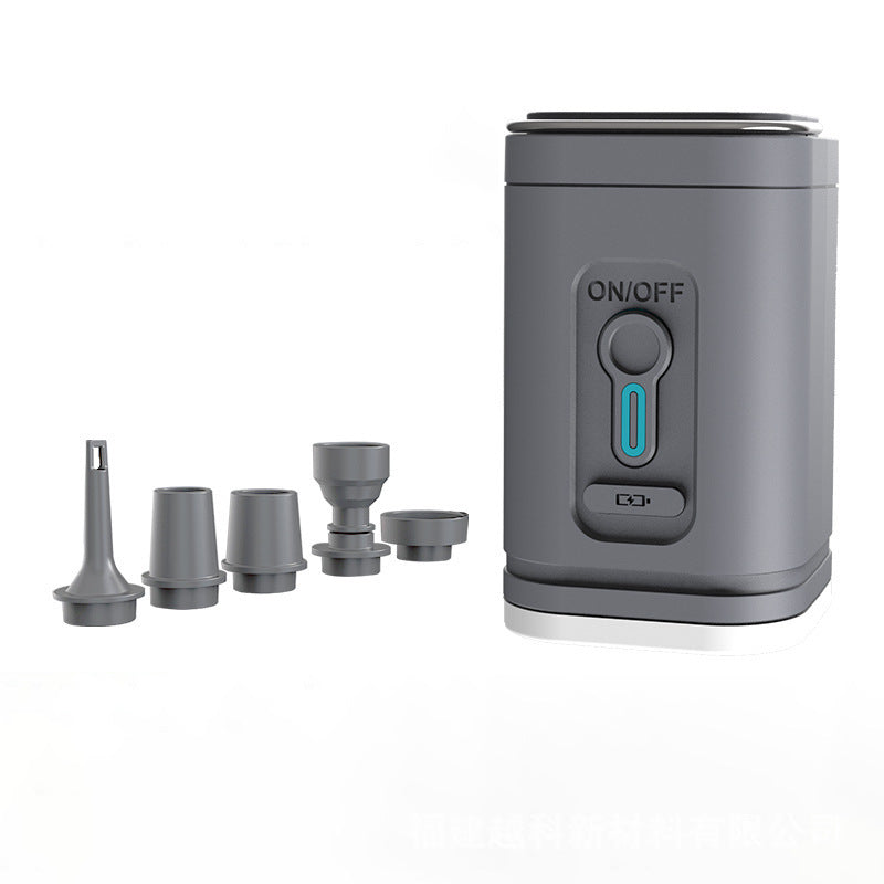 Gray rechargeable air pump beside its nozzle attachments