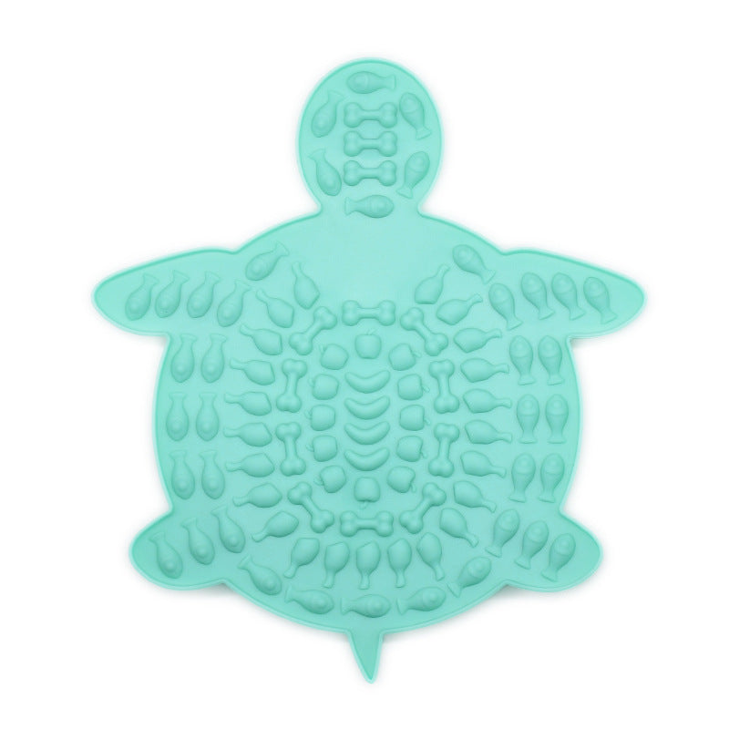 Cyan turtle-shaped silicone pet lick mat with textured surface