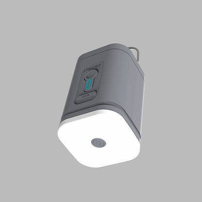Underside of the gray air pump showing the light panel