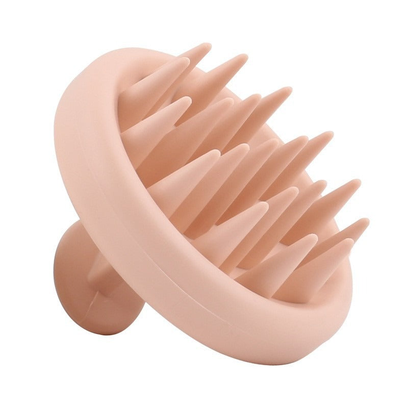 Angled view of the silicone scalp massage brush