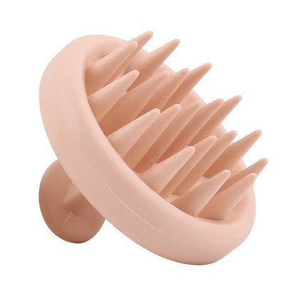 Angled view of the silicone scalp massage brush
