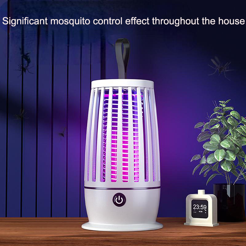 White mosquito trap lamp standing on a table