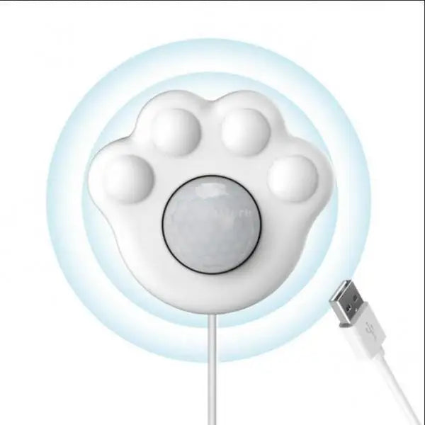 White paw-shaped USB motion sensor with cable