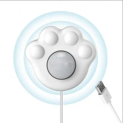 White paw-shaped USB motion sensor with cable