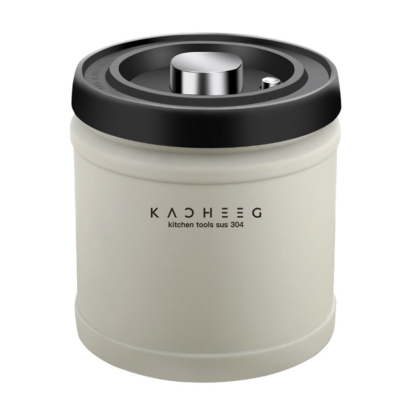 Closed stainless steel storage canister with a black press-style lid