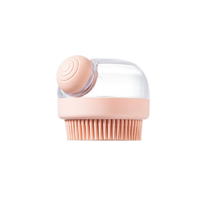 Side view of the pink shampoo-dispensing brush