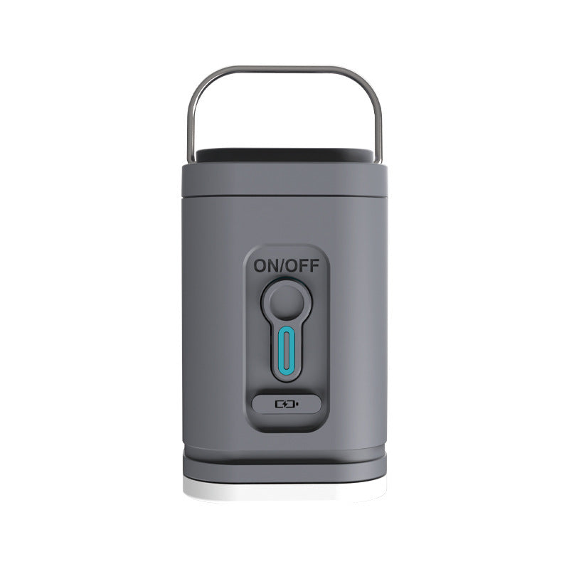 Gray rechargeable air pump with its carry handle raised