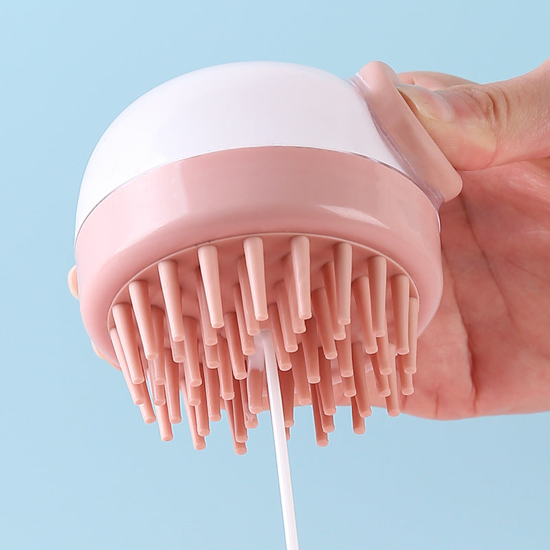 Shampoo flowing through the bristles of the pink dispensing brush