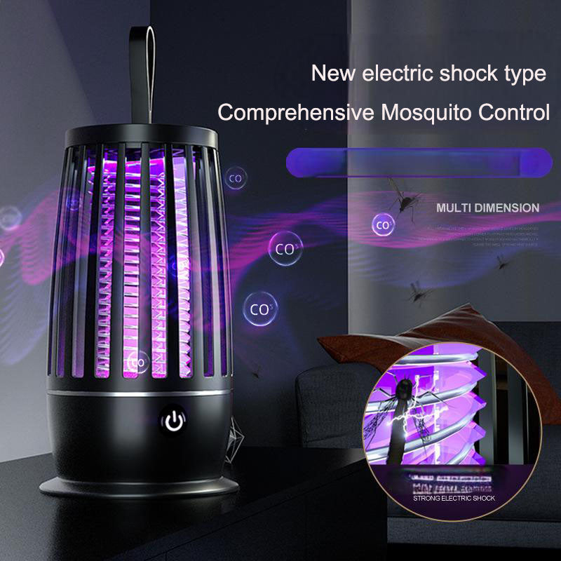 Black electric insect trap with a close-up of its illuminated grid