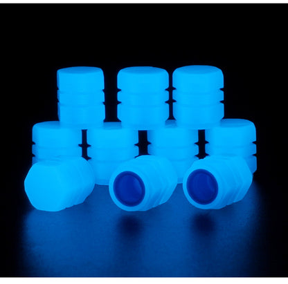 Blue tire valve caps shown glowing against a dark background