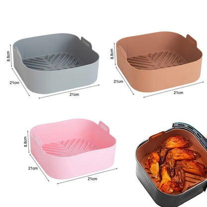 Three silicone air fryer liner colors and a liner containing cooked food