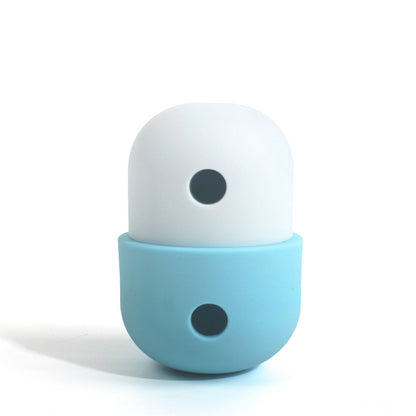 Ivory and light blue treat-dispensing pet toy