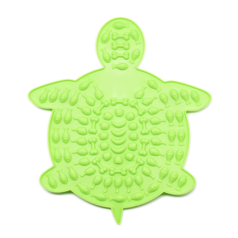 Green turtle-shaped silicone pet lick mat with textured surface