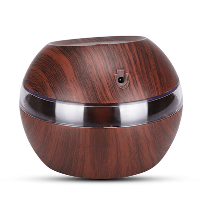 Rear view of the dark woodgrain humidifier and power connection