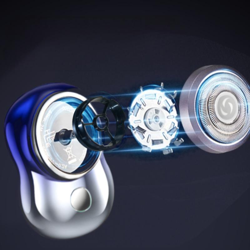 Exploded illustration of the mini shaver's rotary head assembly