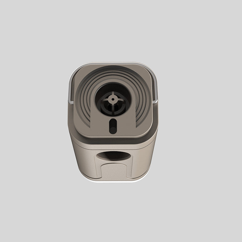 Top view of the tan air pump showing its air outlet