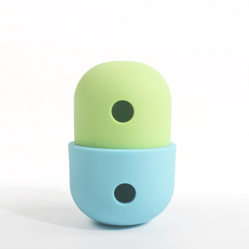 Light green and blue treat-dispensing pet toy