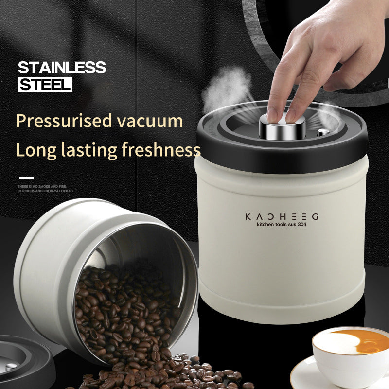 Press-lid canister shown with a second open container of coffee beans