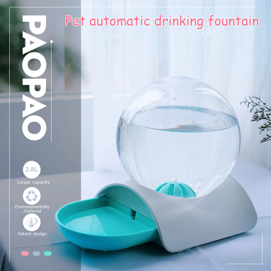 Gravity pet water dispenser with a clear round reservoir and green bowl