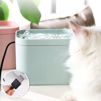 Green pet fountain with a USB connector inset